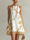 Héloïse | Vestido mini de encaje blanco con motivos dorados
