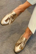 Aina | Mocasines Dorados Metalizados con Borlas y Costuras Decorativas