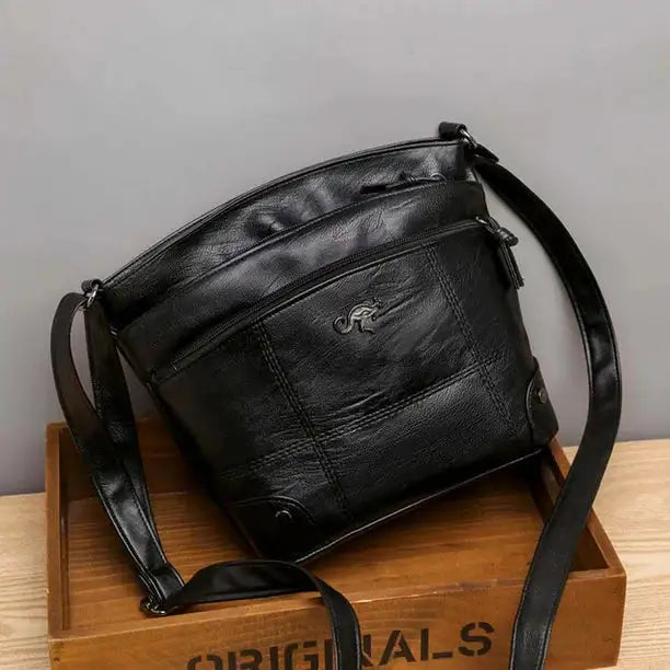 Silvia | Bolso Cruzado con Emblema