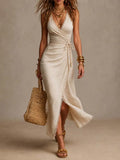 BIANCA | Vestido midi de lino natural con escote cruzado en el frente, volante y borde de encaje