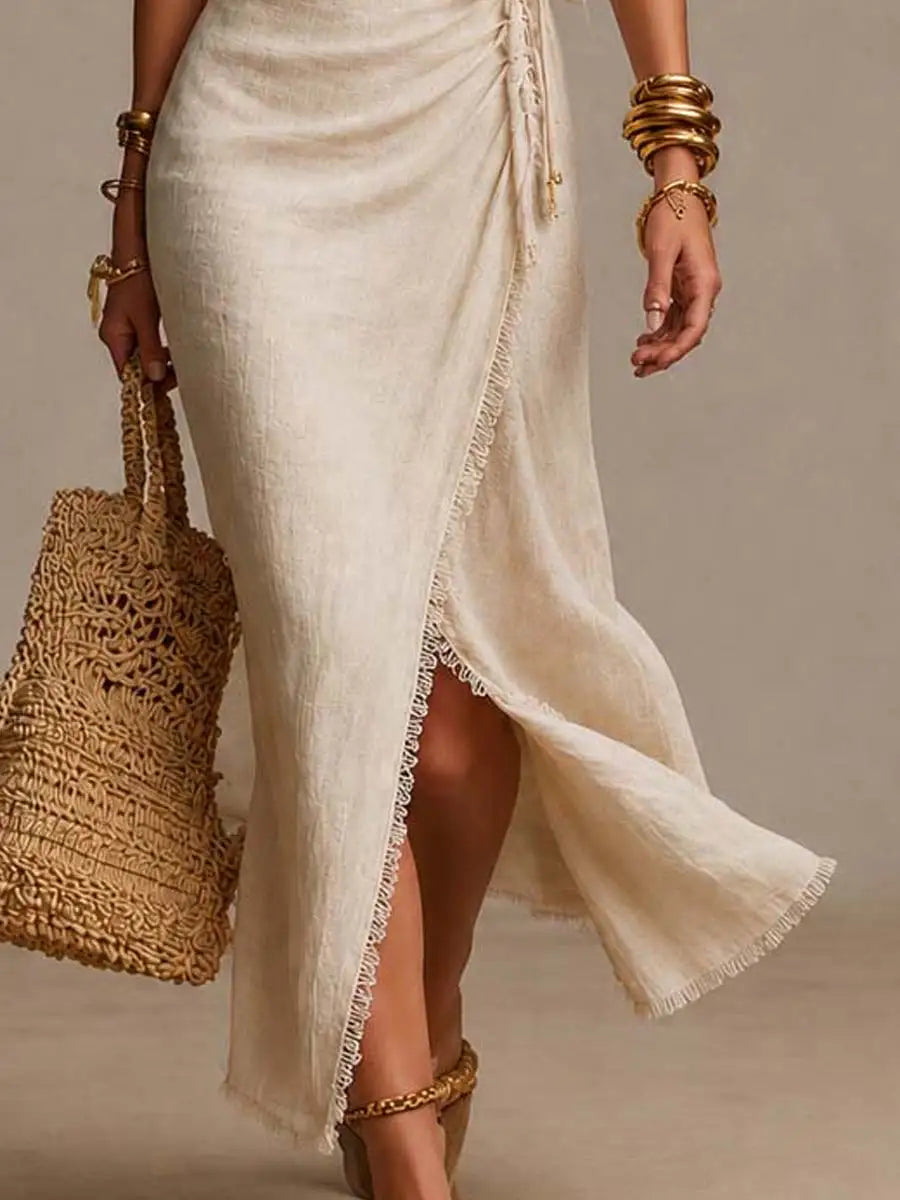 BIANCA | Vestido midi de lino natural con escote cruzado en el frente, volante y borde de encaje