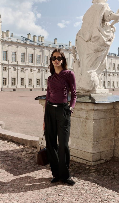 BLUSA DE PUNTO CON PLIEGUES