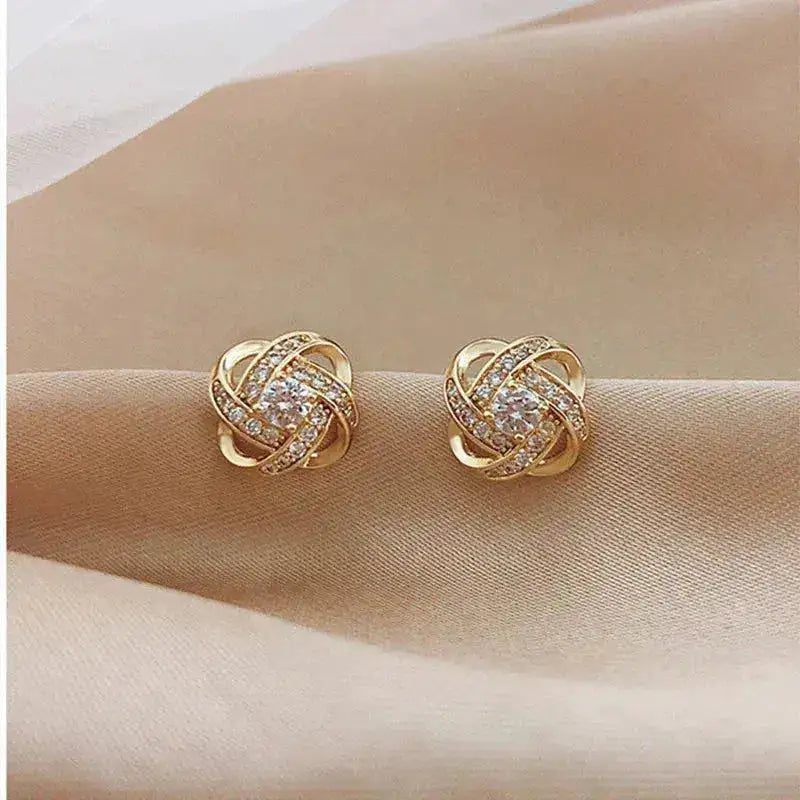 Lourdes | Pendientes Dorados de Espiral con Cristales