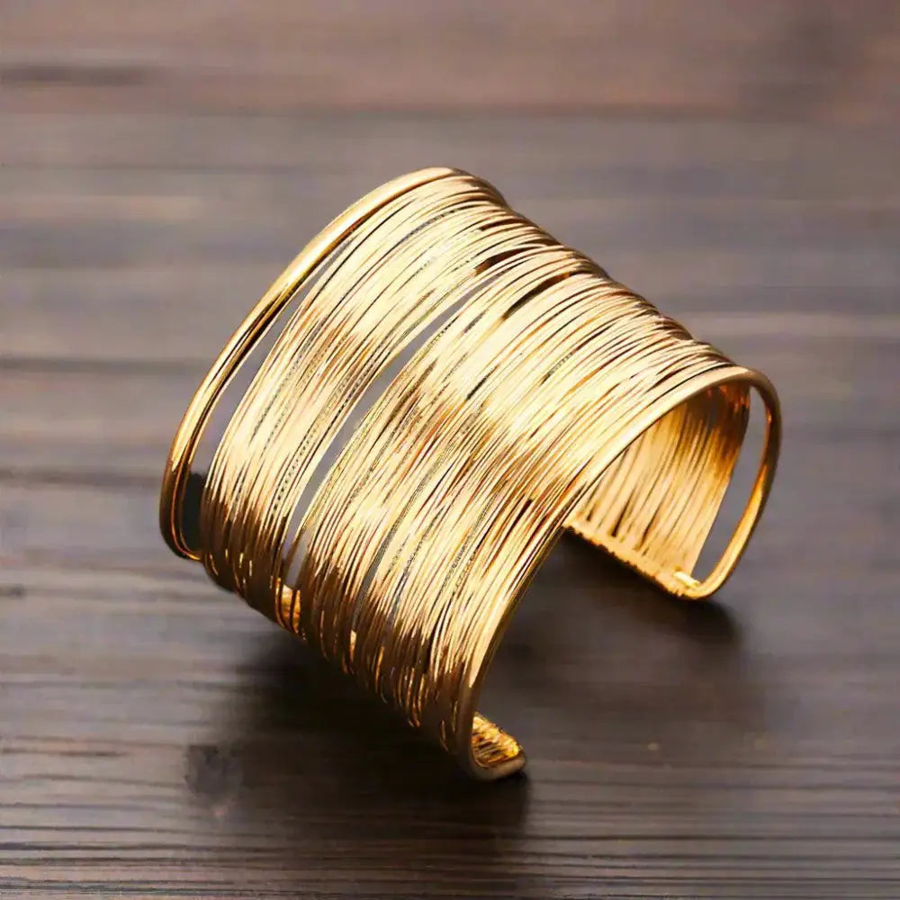 Ouda™ | Brazalete Rígido Dorado
