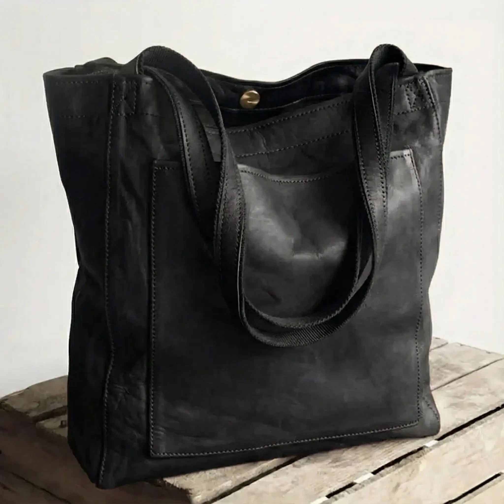 Améll | Bolso de Mano Práctico