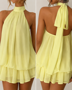 Margot Mini Vestido Halter con Espalda Descubierta y Movimiento