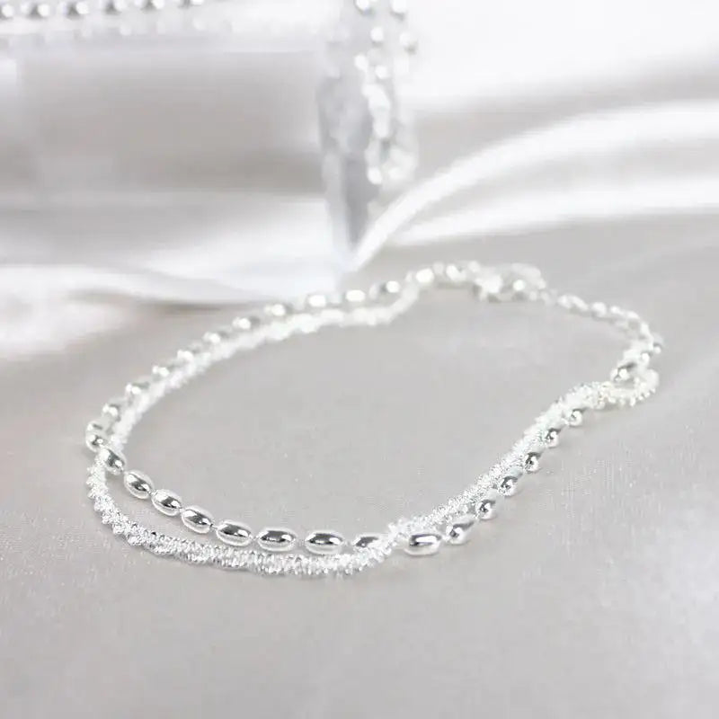 Set de pulseras plateadas con circonitas — Amparo