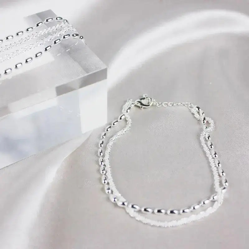 Set de pulseras plateadas con circonitas — Amparo