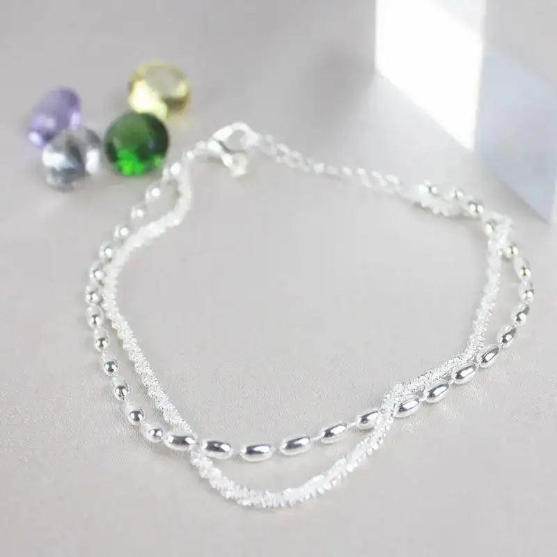 Set de pulseras plateadas con circonitas — Amparo