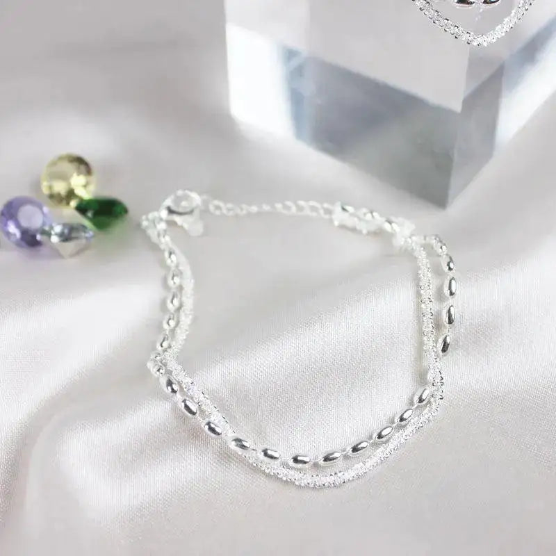 Set de pulseras plateadas con circonitas — Amparo