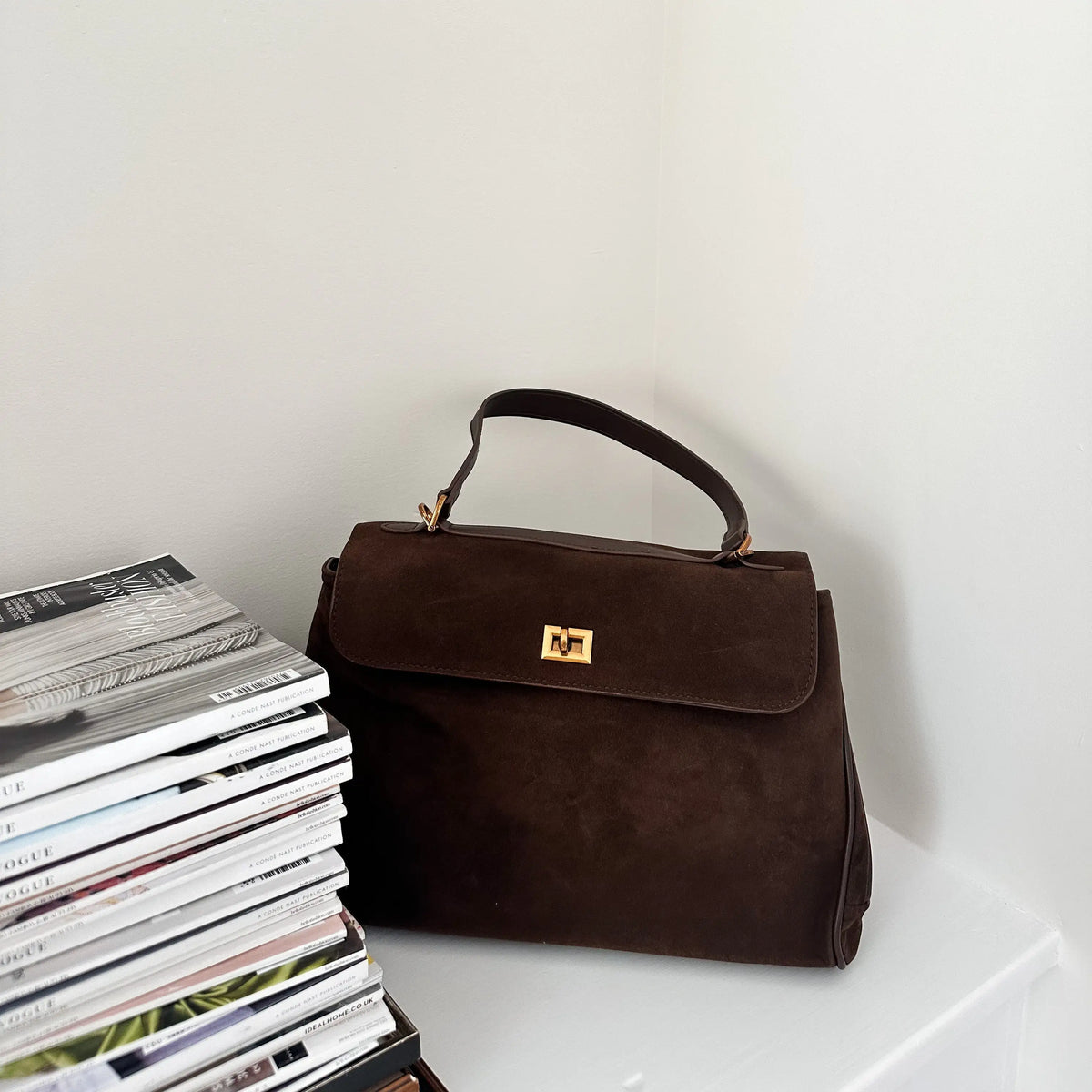 Clara | Bolso de Mano con Detalles Dorados