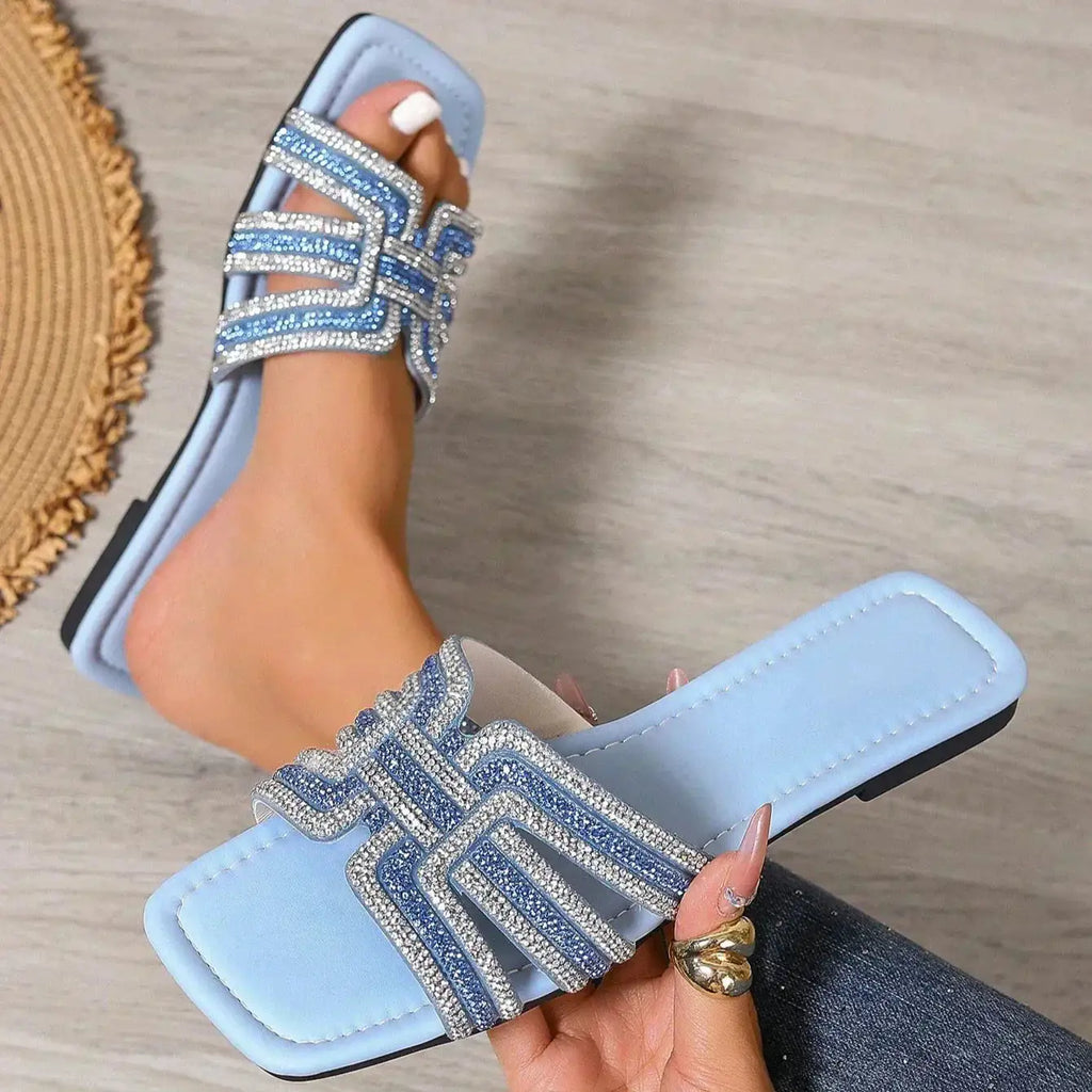 Aria | Sandalias Slide Planas