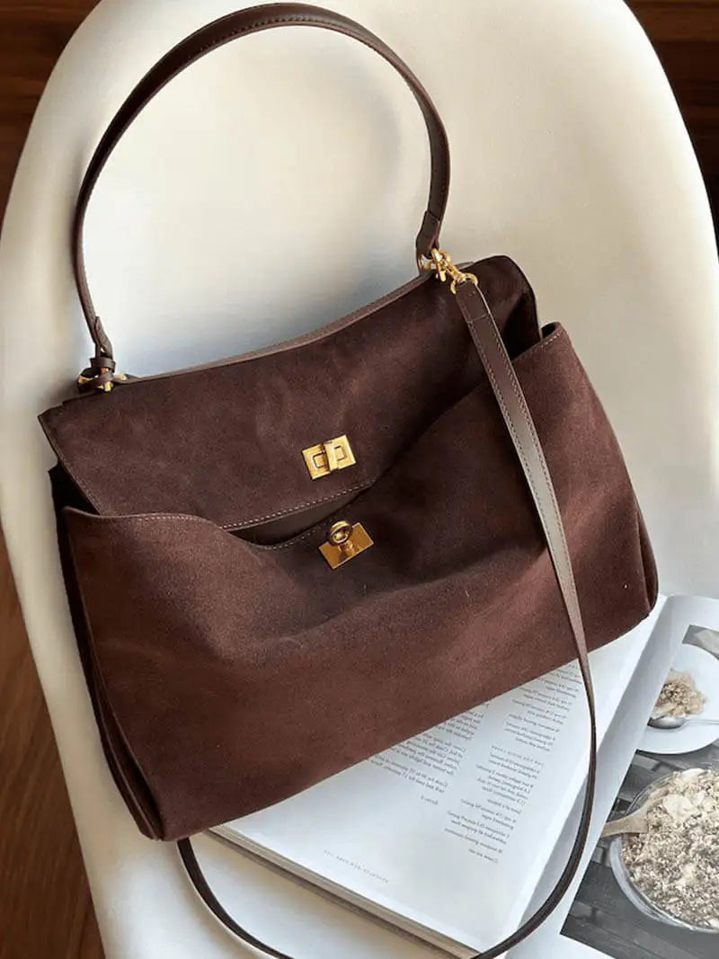 Clara | Bolso de Mano con Detalles Dorados