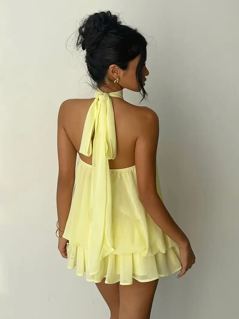 Margot Mini Vestido Halter con Espalda Descubierta y Movimiento