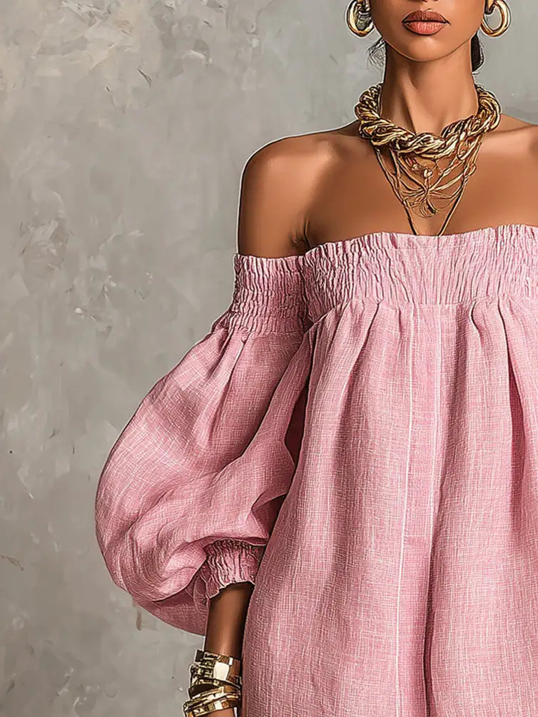 Violette | Vestido mini de silueta trapezoidal rosa con mangas farol y hombros descubiertos