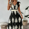 Candela - Vestido maxi barroco con escote en V